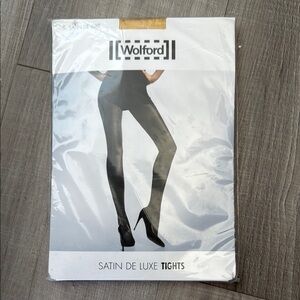 Wolford gold tights. Never worn